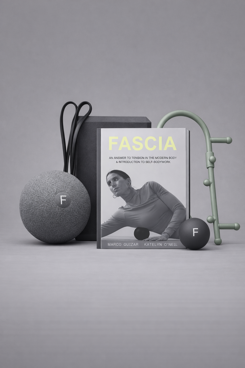 Fascia Reset bundle featuring self-bodywork tools and educational guide for fascia health.